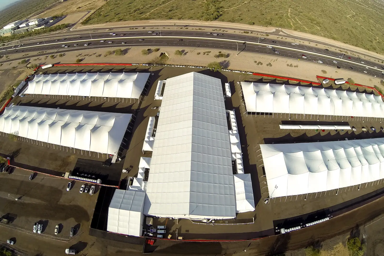 Large clearspan structures, large pole tents, walkway tents and connecting tents and marquees to connect tents and structures making sites safe and secure.
